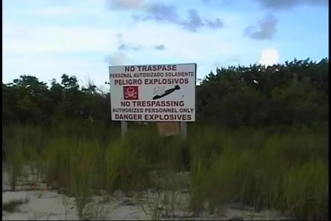 Bombs-Explosives-War military left overs-No Trespassing Sign-1 Stock Footage 4142840