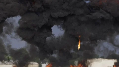 Bombs falling War zone Crisis Huge Red Explosions Slow motion With Fireball 库存影片 347654093