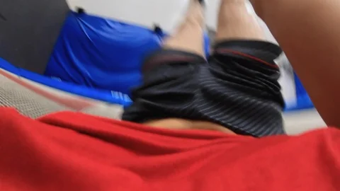 Boncing from back on a Giant Trampoline 库存影片 129473431