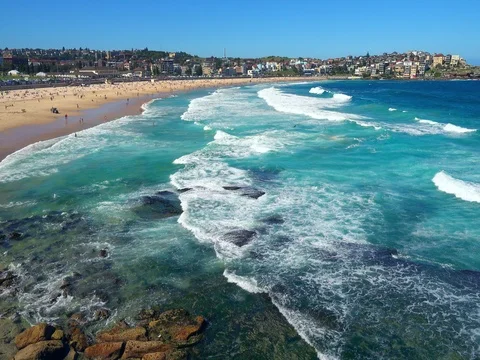 Bondi Beach or Bondi Bay at sunny day in Sydney Stock Footage 80581185