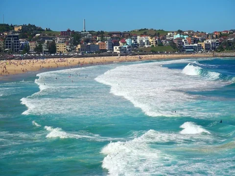 Bondi Beach or Bondi Bay at sunny day in Sydney, people relax at Bondi beach Stock Footage 80581273