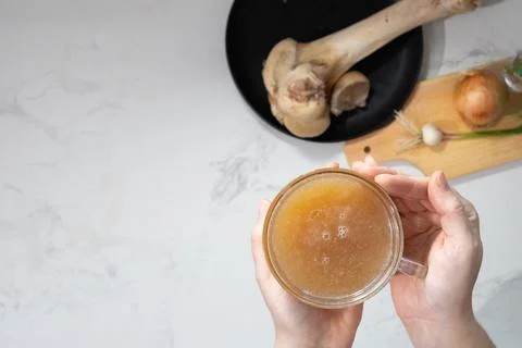 Bone broth for wellness and active longevity: nourishing beverage for healt.. 스톡 사진