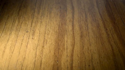 Bone game. Fall of red cubes with white dots on a wooden surface. Vidéo 107513692