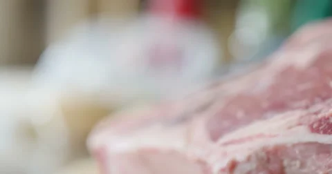 Bone In Ribeye Steaks Thick Raw for Dinner Dolly Shot, 4K Stock Footage 63660089