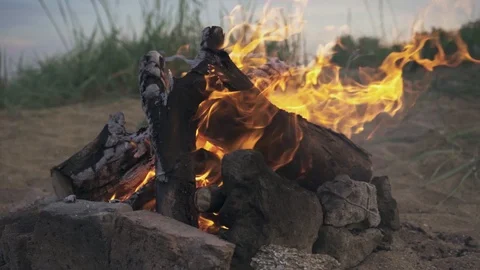 A bonfire on the beach in slow motion Stock Footage 110694906