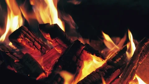 Bonfire burning coal closeup large fire in night. Orange flame on black backdrop Stock Footage 146444976