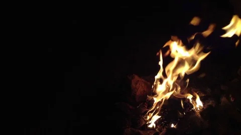 Bonfire burning in the dark cave . Around view Stock Footage 73678978