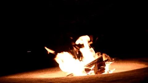 Bonfire. Burning fire in winter on snow and at night. Stock Footage 88814809