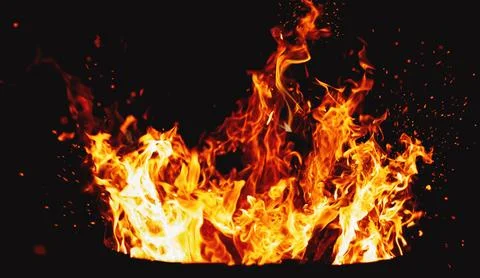 Bonfire burning at night, camp fire ant fire pit, flames and fire sparkles,.. Stock Photos