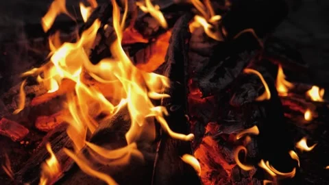 A bonfire burns. Close-up of flames. Summer evening. Slow motion Stock Footage 130734265