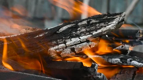 A bonfire burns. Close-up of flames. Summer evening. Slow motion. Close up .. Stock Footage 274186208