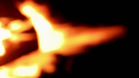 Bonfire close-up. Blurred flames on black Stock Footage 103257054