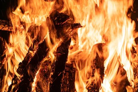 Bonfire with emphasis on the shape of the fire in its orange color, with the Stock Photos
