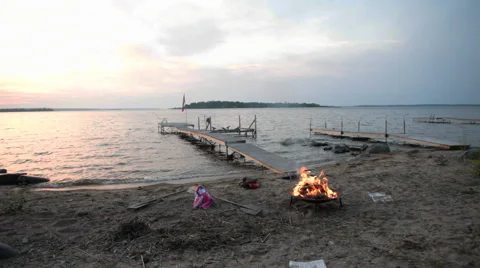 Bonfire Flames in Fire Pit at Beach Sunset in Lake Victoria's Georgian Bay Stock Footage 51174816