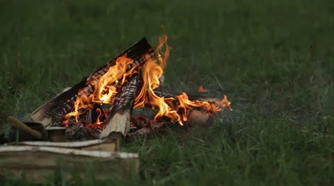 Bonfire on green grass Stock Footage 57763855