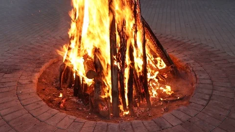 A bonfire from high logs burns Stock Footage 92578129