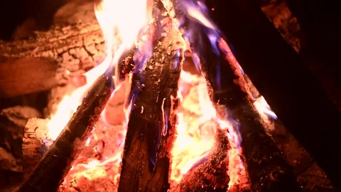 Bonfire at night, logs are burning, sparks are flying. Fire flame close-up. Stock Footage 200420680