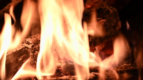 Bonfire at night, logs are burning, sparks are flying. Fire flame close-up. Stock Footage 200420756