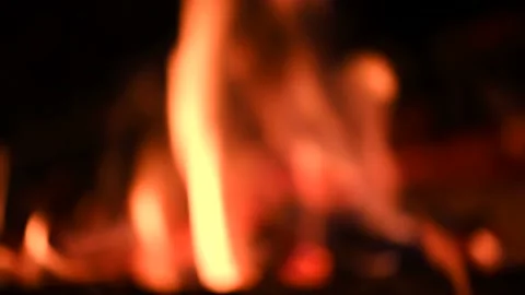 Bonfire at night, logs are burning, sparks are flying. Fire flame close-up. Stock Footage 201126685