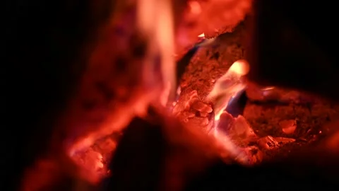 Bonfire at night, logs are burning, sparks are flying. Fire flame close-up. Stock Footage 201348594