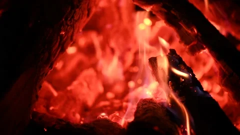 Bonfire at night, logs are burning, sparks are flying. Fire flame close-up. Stock Footage 201389666