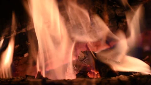 Bonfire at night, logs are burning, sparks are flying. Fire flame close-up. Stock Footage 201670742