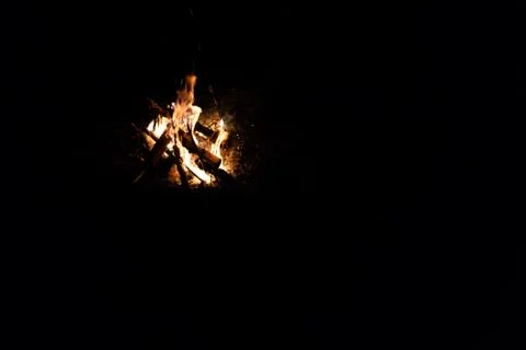 Bonfire. Orange flame of a fire. Arson or natural disaster. Bonfire close. Fi Stock Photos