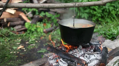Bonfire pot with boiling soup 動画素材 24631262