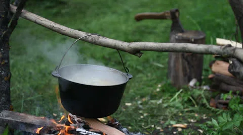 Bonfire pot with boiling soup Stock Footage 24632708