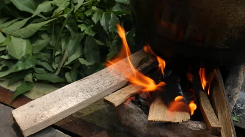 Bonfire for Rattan Dyeing Process, Borneo, 4K Stock Footage 148196294