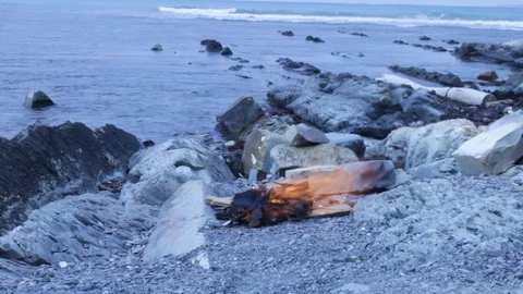 Bonfire at sea and waves Stock Footage 116252745