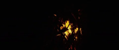 Bonfire set ablaze at night Stock Footage 80998727