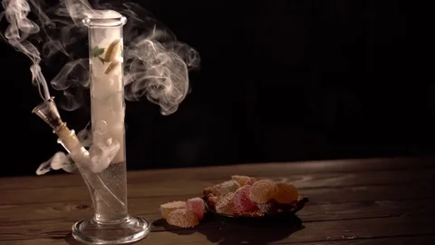 Bong with marijuana on a black background 스톡 동영상 83048448