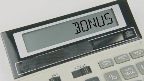 Bonus Text or Words and Hand Typing Calculator Concept Stock Footage 307018691