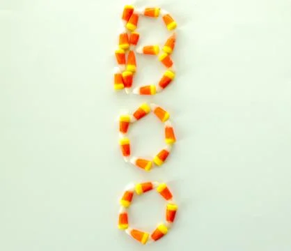 BOO spelled out in candy corn vertically Foto stock