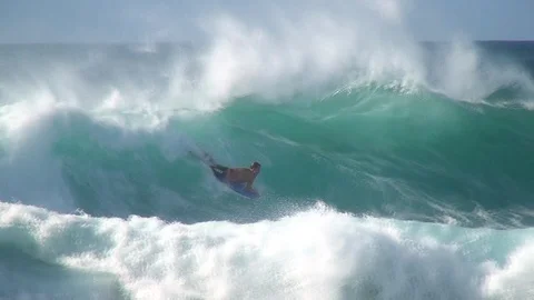 Boogie boarder having fun on big wave Stock Footage 92703021