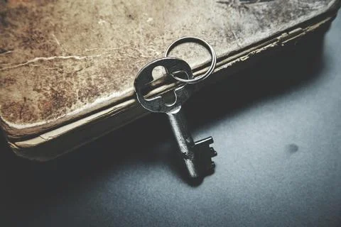 Book and key Stock Photos