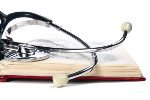Book and stethoscope Stock Photos