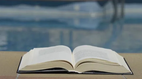 Book and swimming Pool Stock Footage 51431585