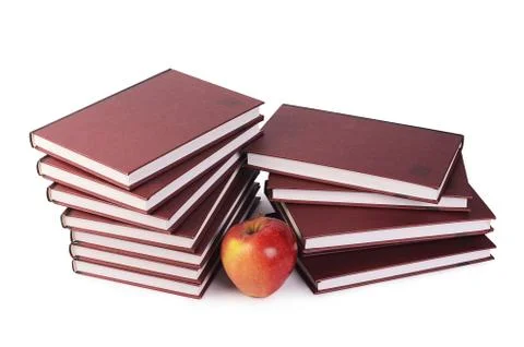 Book with apple isolated on white Stock Photos