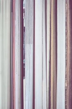 Book background made of many text blocks. Stock Photos