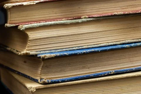Book background. Stack of books in the library. Old yellow pages of paper boo Foto stock