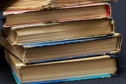 Book background. Stack of books in the library. Old yellow pages of paper boo Foto stock