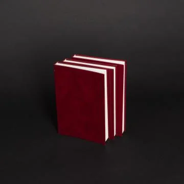 Book on black background Stock Photos