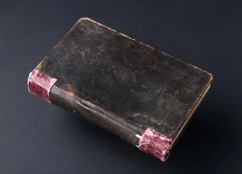 Book on black background Stock Photos