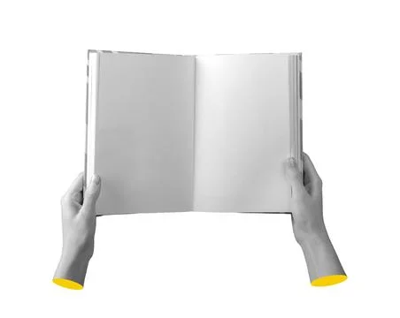 Book with blank pages held in hand. Open layout with clean empty sheet, clear Stock Photos