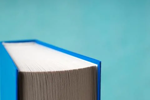 Book on a blue background. Back to school. Copy space Stock Photos