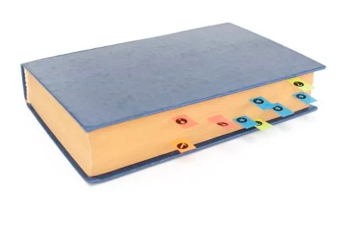 Book with bookmarks on a white background Stock Photos