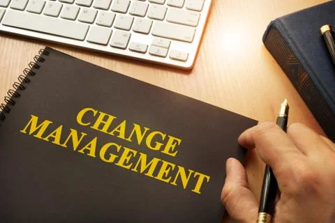 Book with change management on a table. Stock Photos