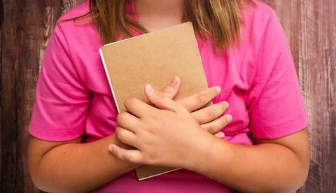 Book in children's hands Stock Photos